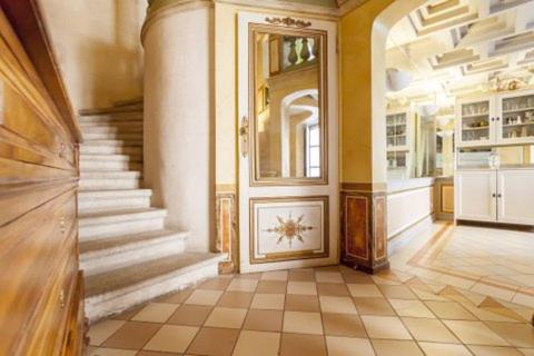 a room with a staircase and a door in a building at Vieux-Lyon - Maison Renaissance in Lyon