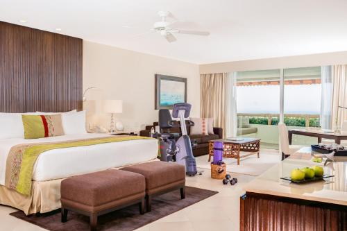 Postel nebo postele na pokoji v ubytování Grand Velas Riviera Nayarit-All Inclusive