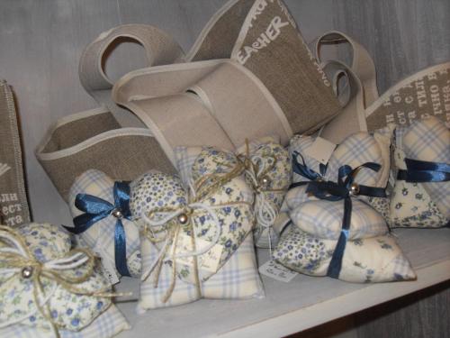 a bunch of bows sitting on a shelf at Agriturismo Cannavota in Follonica