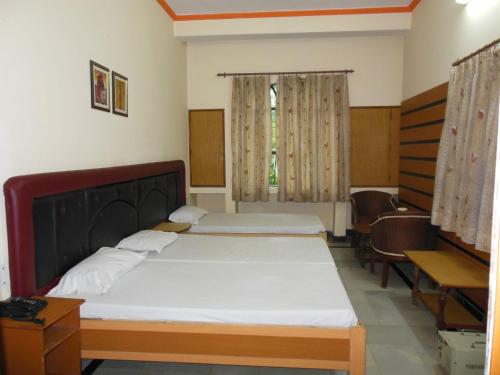 Katil atau katil-katil dalam bilik di Hotel Taj Plaza, VIP Road, Agra
