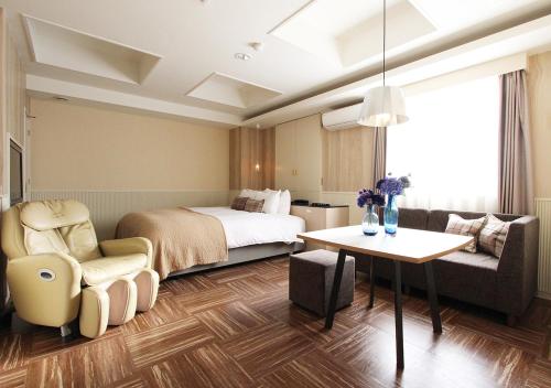 Postel nebo postele na pokoji v ubytování Hotel neobibi (Adult Only)
