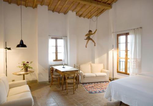 A bed or beds in a room at Locanda Casanuova