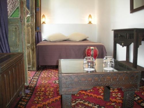 Cama ou camas em um quarto em Riad Arous Chamel