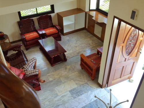 an overhead view of a living room with furniture at Sofias House Rental in Tagbilaran City