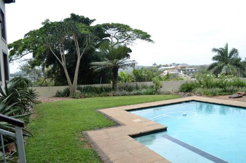 Kolam renang di atau dekat dengan Three Palms One Bedroom Apartment - SOLAR