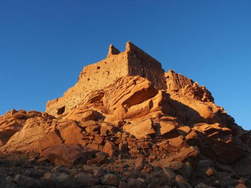 a building on the side of a rocky mountain at Auberge Tafouyt in Tamtetoucht