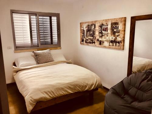 Кровать или кровати в номере Luxury Apartments