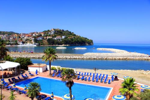 a resort with a swimming pool and a beach at Hotel Mare in Agropoli