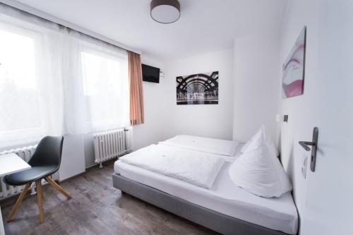 Postel nebo postele na pokoji v ubytování SOVA Hotel