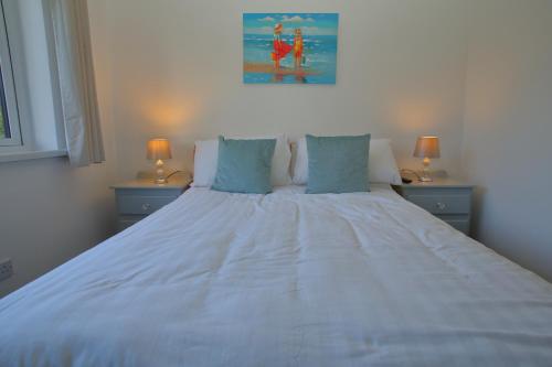 Ένα ή περισσότερα κρεβάτια σε δωμάτιο στο Riverfield Bed and Breakfast