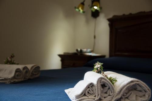 Posteľ alebo postele v izbe v ubytovaní Le Lanterne Appartamenti a San Vito Lo Capo (Centro)