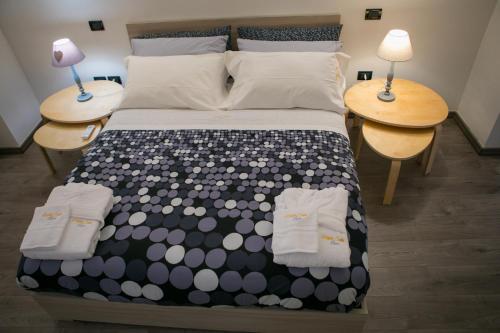 Postel nebo postele na pokoji v ubytování Miklù Luxury Suite