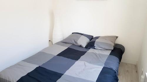 Postel nebo postele na pokoji v ubytování La plus belle de main