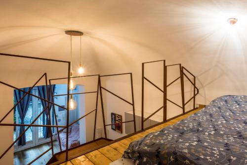 a bedroom with a bed and a window at Garibaldi 13 in Turin
