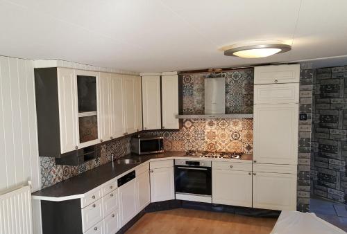 Kuchyň nebo kuchyňský kout v ubytování Vinkenhof 6-8 personen