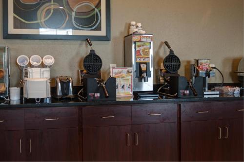 a counter with many items on top of it at Cobblestone Hotel and Suites - Jefferson in Jefferson