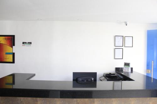 Kuchyň nebo kuchyňský kout v ubytování Hotel Pereira 421