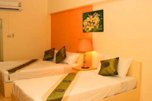 Posteľ alebo postele v izbe v ubytovaní Casa Narinya @ Suvarnabhumi Airport
