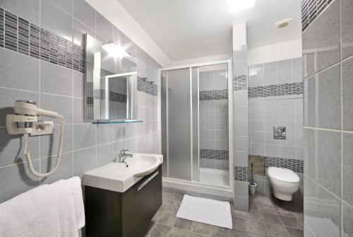 Koupelna v ubytování Salvator Superior Apartments
