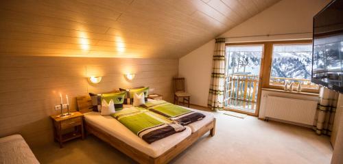 Un pat sau paturi într-o cameră la Haus Annette
