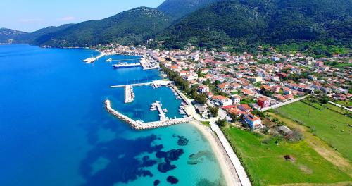 an aerial view of a town on the water at stunning tranquil villa with private pool in Sami