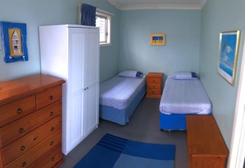 Katil atau katil-katil dalam bilik di Clareview, 8 Korogora Street