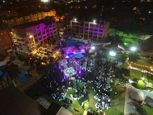 an overhead view of an event in a city at night at Africana Hotel & Spa in Borg El Arab