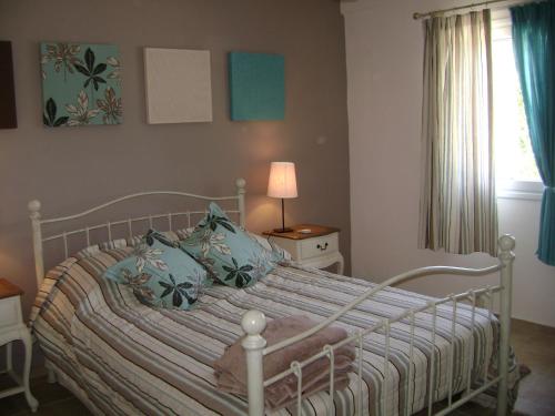 Postel nebo postele na pokoji v ubytování Gidalia Villa