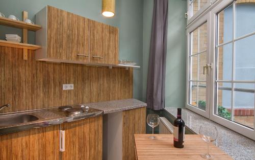 Kuchyň nebo kuchyňský kout v ubytování Singer109 Hostel, Hotel & Apartment