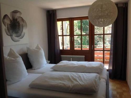 Postel nebo postele na pokoji v ubytování Appartements am Park