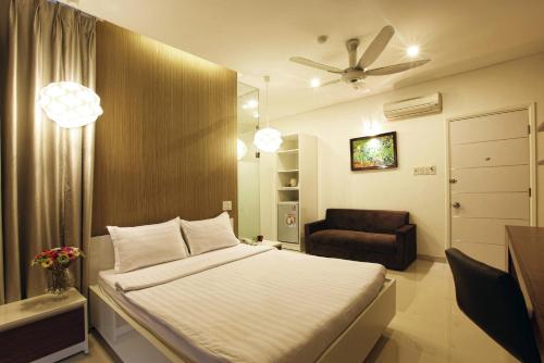 מיטה או מיטות בחדר ב-Yellow House Saigon