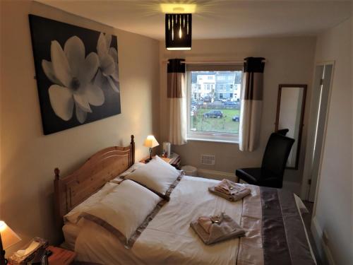 Cama o camas de una habitación en The Haldon Guest House