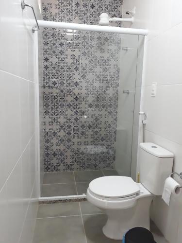 a bathroom with a toilet and a shower at Pousada Convento da Conceição in Olinda
