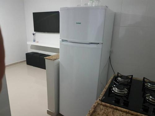 Η κουζίνα ή μικρή κουζίνα στο Apartamento Cabo Frio