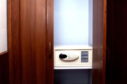 a remote control sitting inside of a room at Kumari Boutique Hotel in Kathmandu