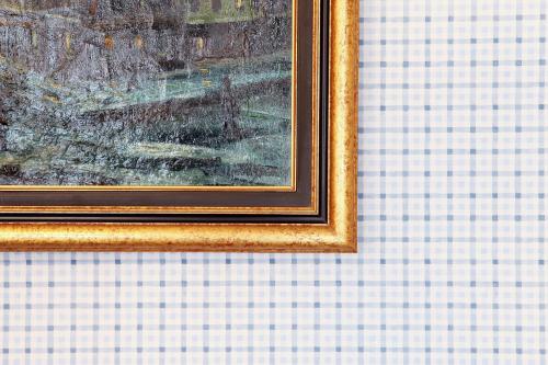a picture of a painting on a wall at Logis Hôtel Ettenheim in Strasbourg