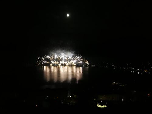 a fireworks display in the water at night at Acquachiara in Ponte Tresa