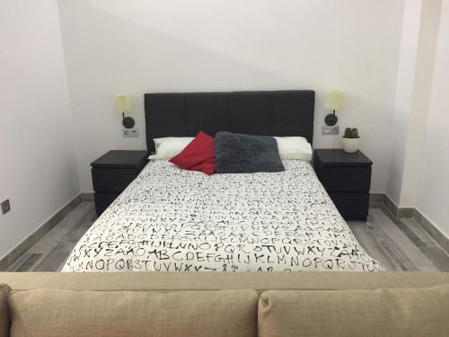 Cama o camas de una habitación en Loft Alfa