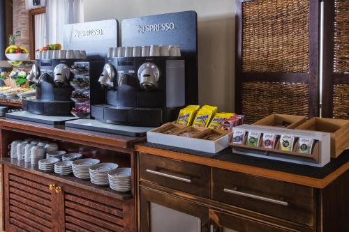 a buffet with food and other items on a counter at Hotel Monasterio Benedictino in Calatayud