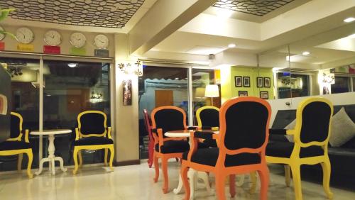 Un lugar para sentarse en The Inn Saladaeng