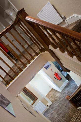 an overhead view of a stairs with a room at Woodthorpe Hotel in Skegness