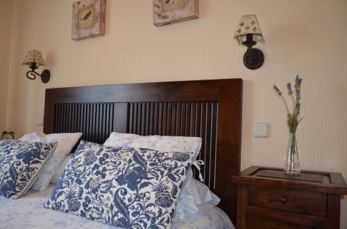 Cama o camas de una habitación en Apartamentos Turísticos Carrero