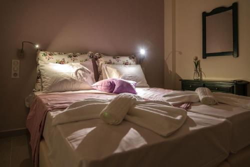 
Ένα ή περισσότερα κρεβάτια σε δωμάτιο στο Villa Albanis

