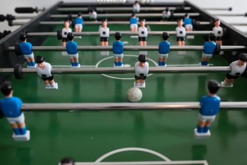 a group of miniature figurines of a soccer game at Apartments Dania in Lopar