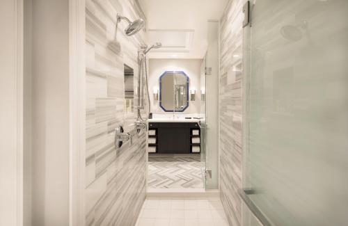 a bathroom with a sink and a mirror at Caesars Palace Hotel & Casino in Las Vegas