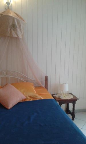 Łóżko lub łóżka w pokoju w obiekcie Appartement Villegiature
