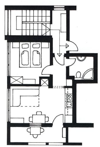 a black and white floor plan of a house at Haus Mitti in Heinfels