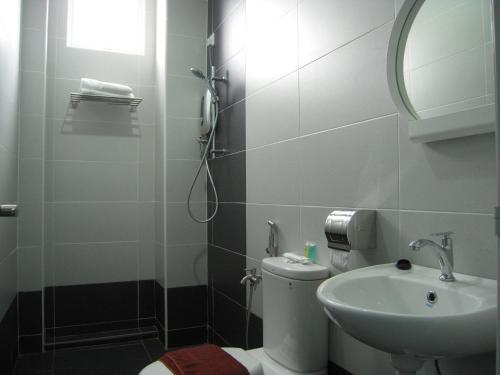 Koupelna v ubytování L Hotel