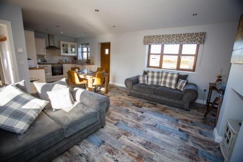 Uma área de estar em Millmoor Farm Holidays