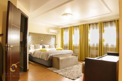 Cama o camas de una habitación en Hotel Résidence La Falaise